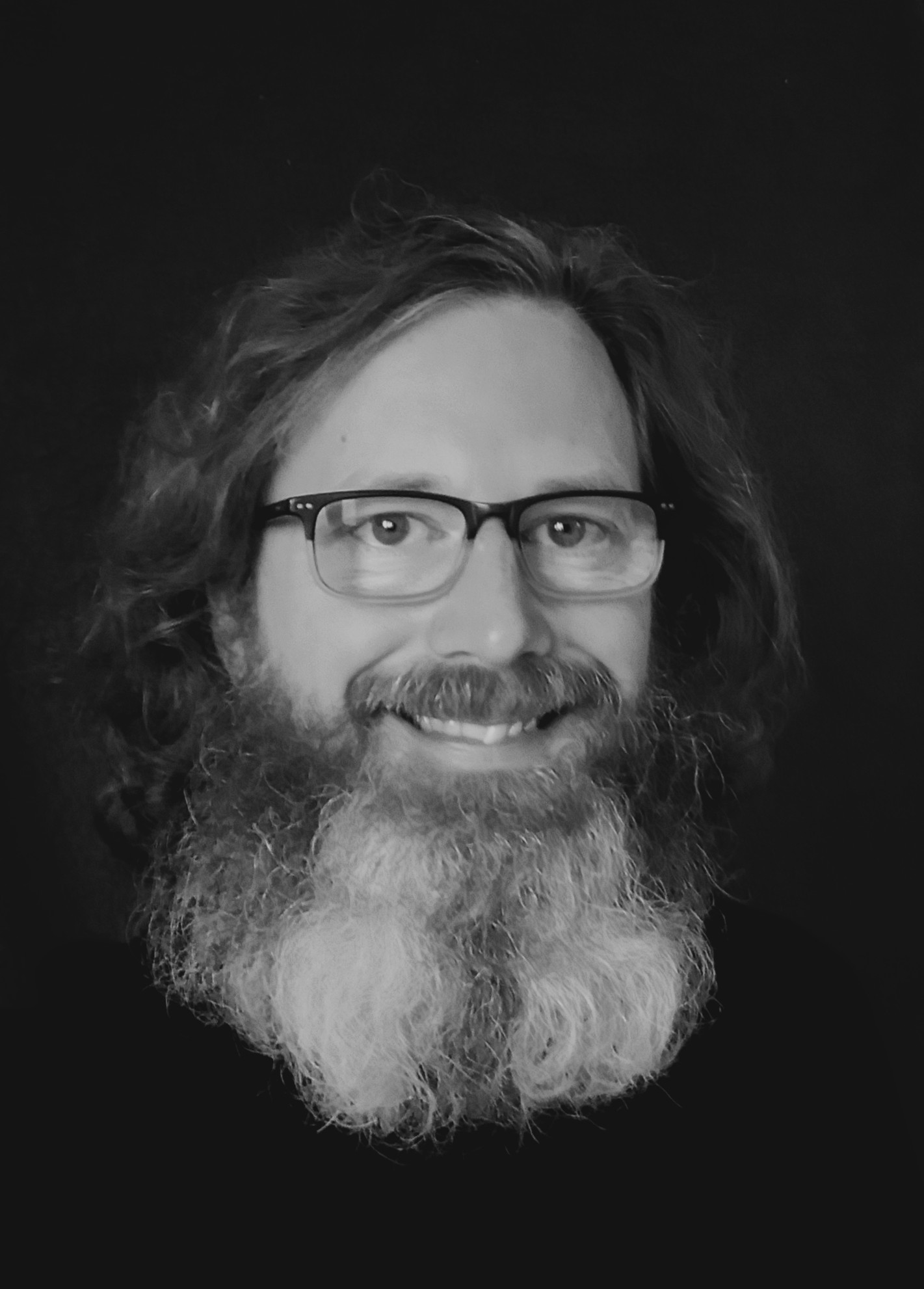 b+w portrait photo of Pete Woolley looking most handsome